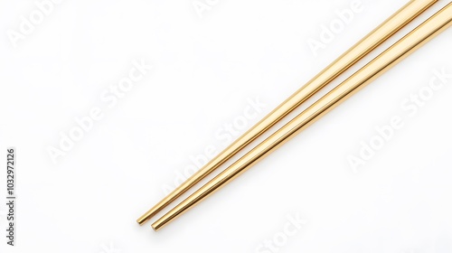 Gold Chopsticks isolated on white background. 