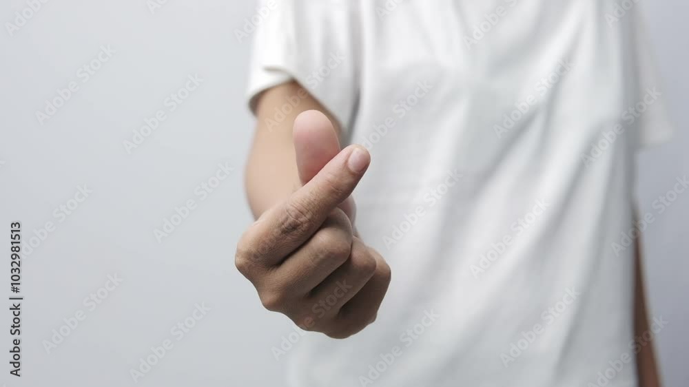 female hand shows gesture give money on the white background female hand shows gesture give money on the white background