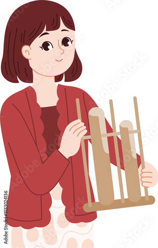 woman playing indonesia traditional musical instrument angklung photo