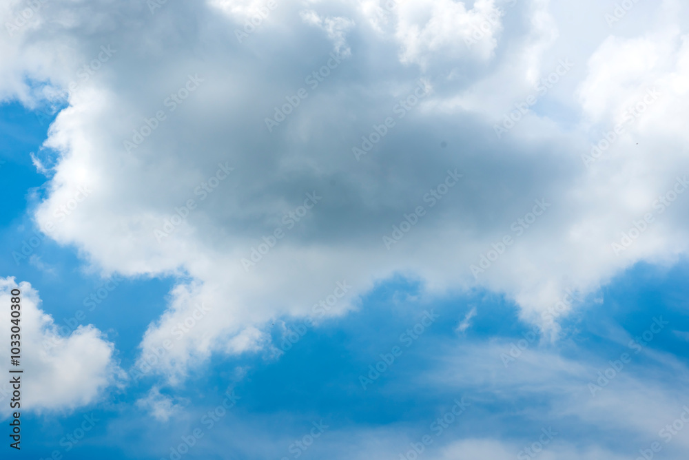 Tropical summer blue sky fluffy white cloud summertime on light sunny day cloudscape. Clear bright blue skyline spring sunlight climate background. Heaven blue environment ecology high scenic nature. Tropical summer blue sky fluffy white cloud summertime on light sunny day cloudscape. Clear bright blue skyline spring sunlight climate background. Heaven blue environment ecology high scenic nature.