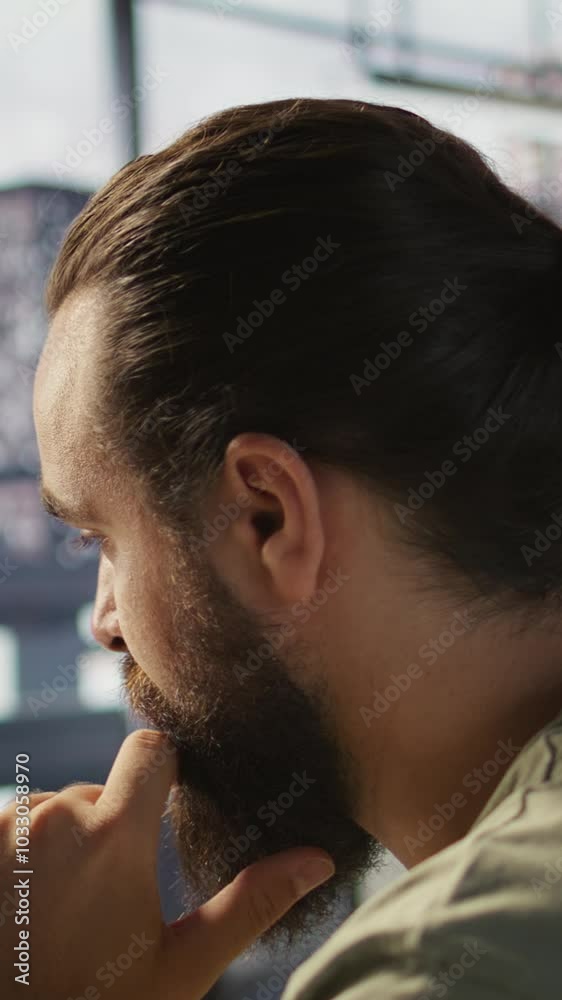 Vertical video Pensive employee using computer to analyze datasets, focused on comparing datasets and checking accounting figures. Close up of man concentrating on solving tasks for team project Vertical video Pensive employee using computer to analyze datasets, focused on comparing datasets and checking accounting figures. Close up of man concentrating on solving tasks for team project