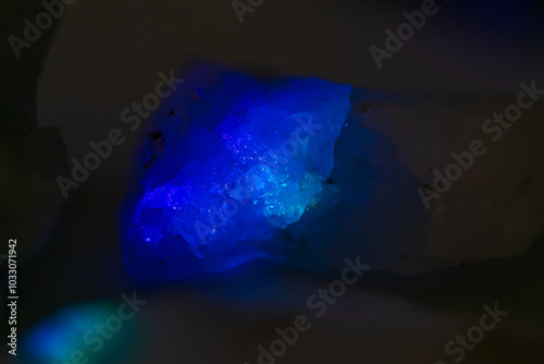 quartz crystal in glowing blue light