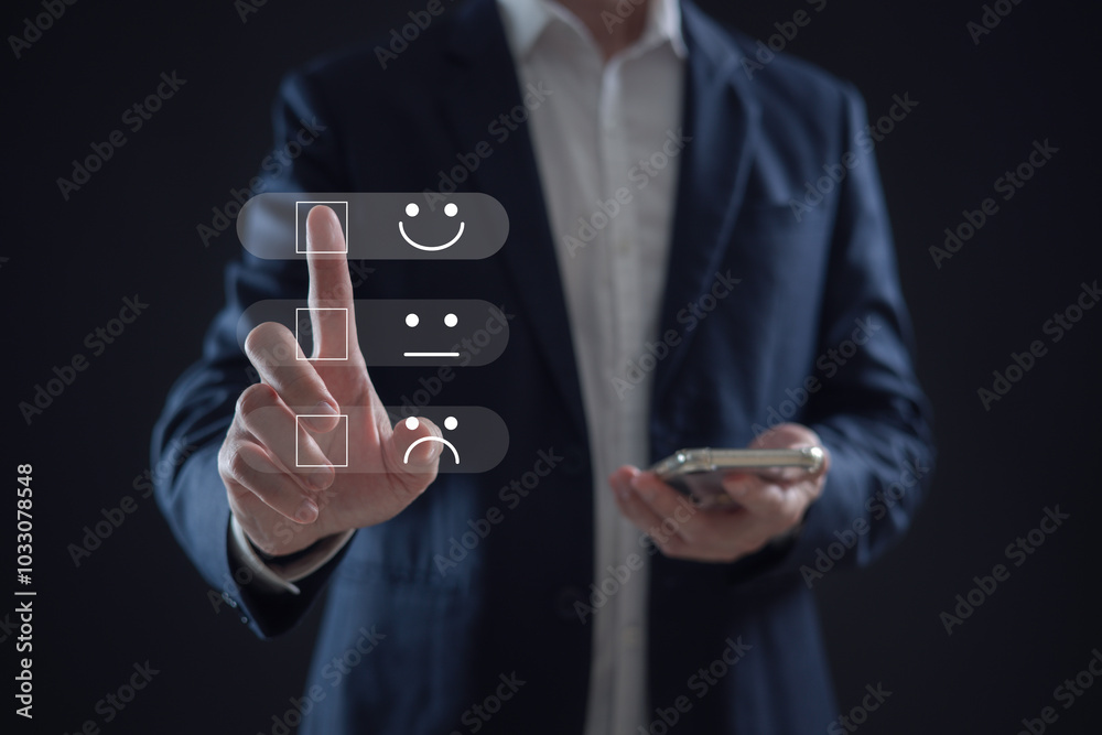 customer service evaluation and feedback rating. costumer review concept, man using phone chooses happy smiling face customer service evaluation and feedback rating. costumer review concept, man using phone chooses happy smiling face