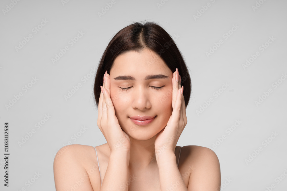 Beautiful young asian woman with clean fresh skin on face. Girl facial treatment. Cosmetology, beauty and spa. Beautiful young asian woman with clean fresh skin on face. Girl facial treatment. Cosmetology, beauty and spa.