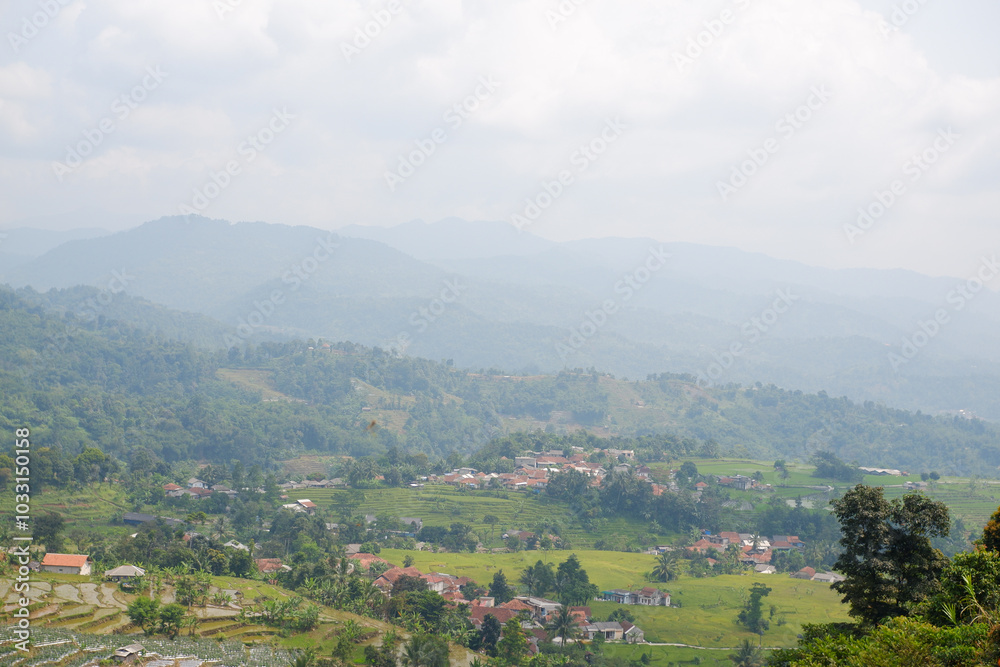 Beautiful view of green hills and mountains with lots of fog around Beautiful view of green hills and mountains with lots of fog around