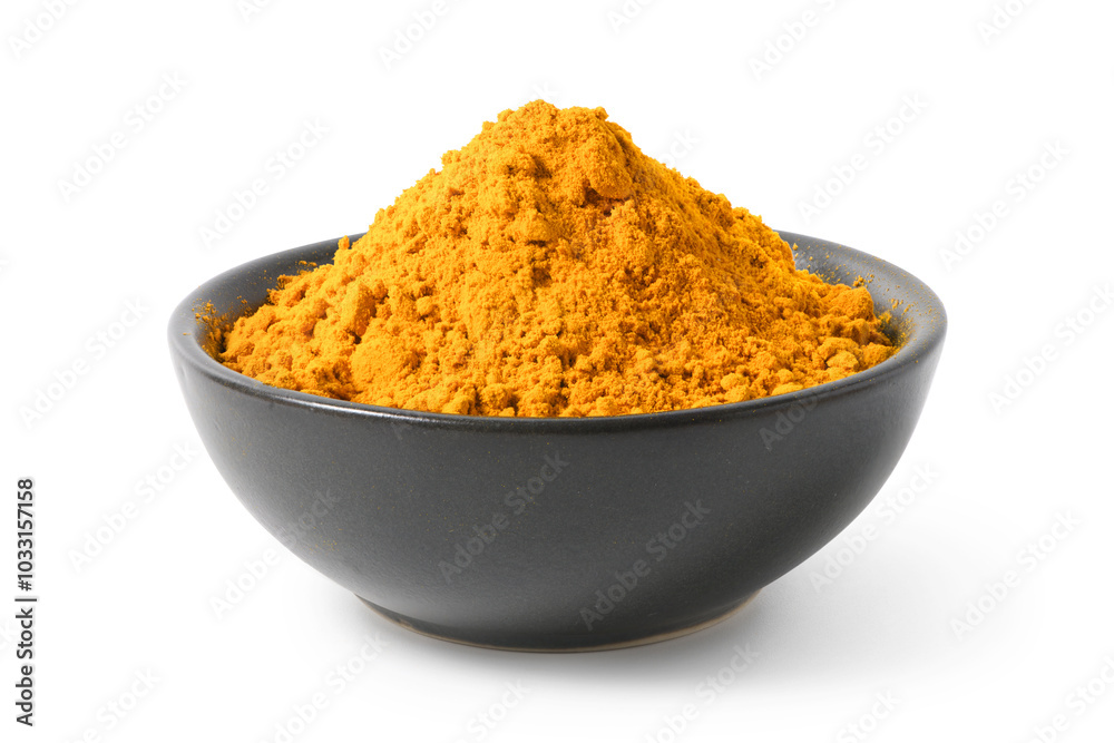 Finely dry Turmeric (Curcuma longa Linn) powder in black bowl isolated on white background. Clipping path. Finely dry Turmeric (Curcuma longa Linn) powder in black bowl isolated on white background. Clipping path.