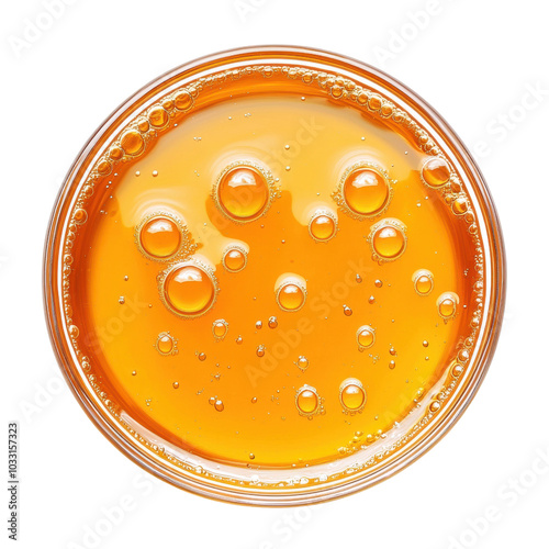 Orange drink with bubbles, white background photo