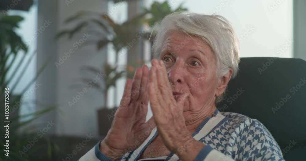 Elderly woman with graying hair talks about mental disorder and consequences of psychological trauma. Female patient shares experiences and fears. Treatment of mental disorders. Close up. Portrait. Elderly woman with graying hair talks about mental disorder and consequences of psychological trauma. Female patient shares experiences and fears. Treatment of mental disorders. Close up. Portrait.