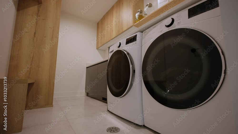 Elements of Modern Laundry room in house. Move camera shot Elements of Modern Laundry room in house. Move camera shot