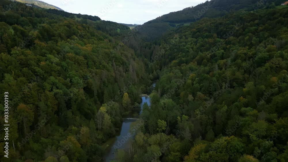 Dolly in drone shot above Orbe river with autumn colors near Saut du Day in Vallorbe Switzerland Dolly in drone shot above Orbe river with autumn colors near Saut du Day in Vallorbe Switzerland