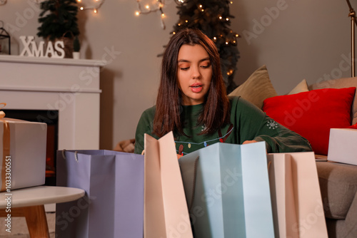Young woman with shopping b...