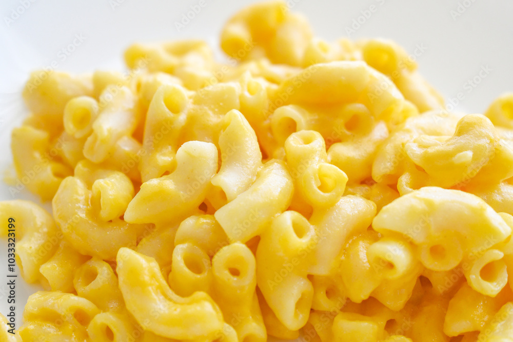 Macaroni and cheese on a plate. Macaroni and cheese on a plate.