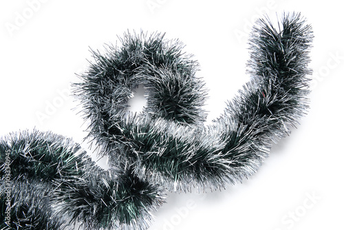 Christmas tinsel on white b...