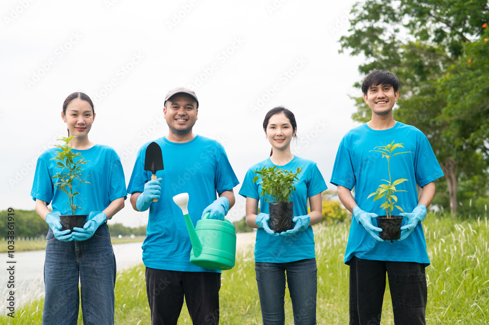 Group of volunteers plant trees to get clean ozone Watering trees in the park Replanting trees that were destroyed To fight climate change and global warming Plant trees along the river rich ecology Group of volunteers plant trees to get clean ozone Watering trees in the park Replanting trees that were destroyed To fight climate change and global warming Plant trees along the river rich ecology