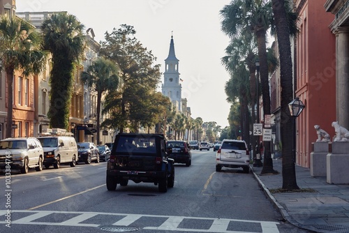 Broad Street in the French Quarter. In the distance is Saint Michael's Church,  Charleston, South Carolina, United States.