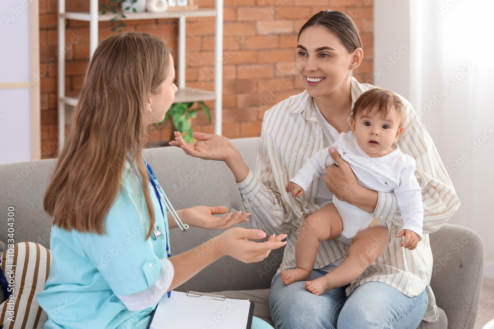 Female pediatrician working with little baby and mother at home Female pediatrician working with little baby and mother at home