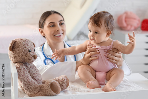 Female pediatrician with li...