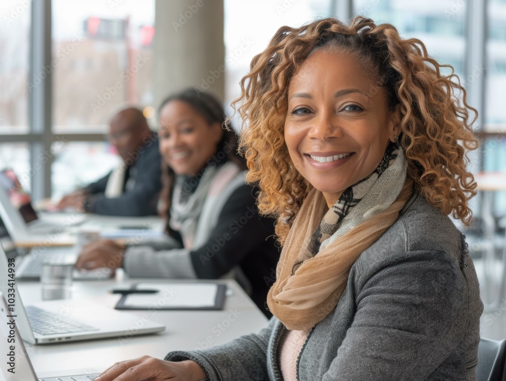 A woman smiles while working on her laptop. AI. A woman smiles while working on her laptop. AI.
