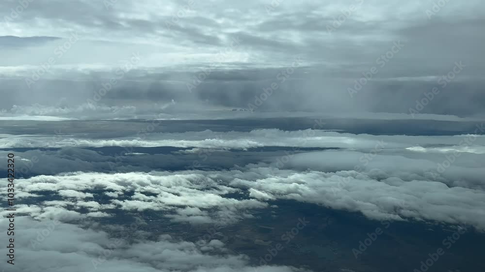 Pilot’s POV FPV during a real time flight through layers of grey clouds in a dramatic winter sky. Aerial footage taken from an airplane cockpit, as seen by the pilots. 4K 60FPS Pilot’s POV FPV during a real time flight through layers of grey clouds in a dramatic winter sky. Aerial footage taken from an airplane cockpit, as seen by the pilots. 4K 60FPS
