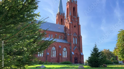 VIDZY is the Church of the Nativity of the Virgin Mary. Catholic Church on a sunny summer day. The Church of the Holy Trinity. It was built in the Neo-Gothic style. The highest in Belarus. 4K photo