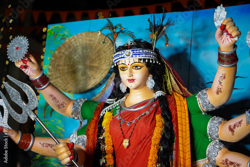 Durga Idol in Chhattisgarh Traditional Style, Festive Goddess Durga Idol with Lion, Chhattisgarh Styled Durga Idol during Navratri, Handcrafted Durga Statue with Lion and Demon Stock Photo.