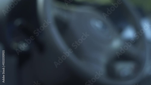 Man hand unlocking car door closeup. Unrecognizable guy opening grey automobile from driver seat