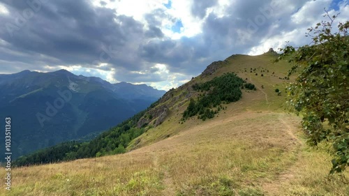 View of the mountain range near Mount Zakan. The top of the mountain node of the western part of the main ridge of the Greater Caucasus. Zakan Peak is the beginning of the Magisho mountain range. 4К photo