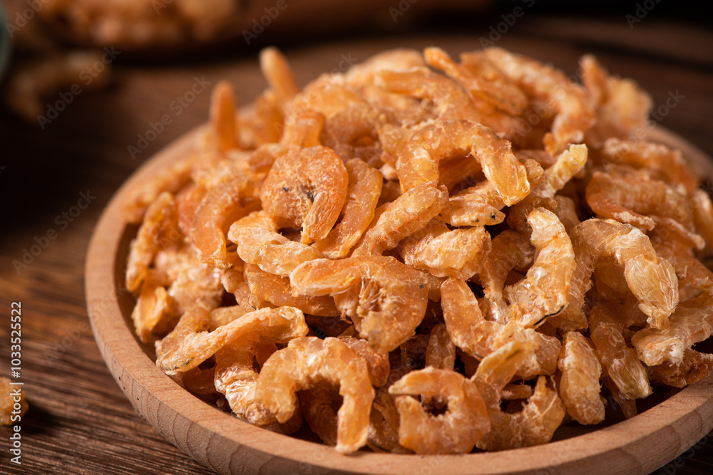 dried shrimp on wooden table. seafood ingredients. dried shrimp on wooden table. seafood ingredients.
