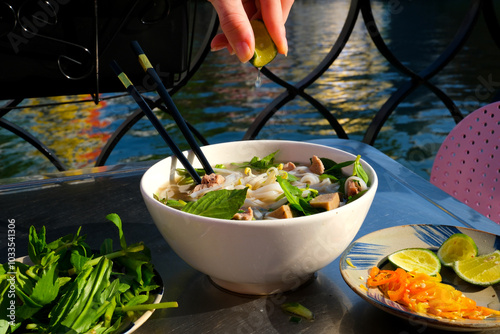 Dolly Shot Savoring Authentic Pho Vietnamese Noodle Soup. Vietnamese pho Soup