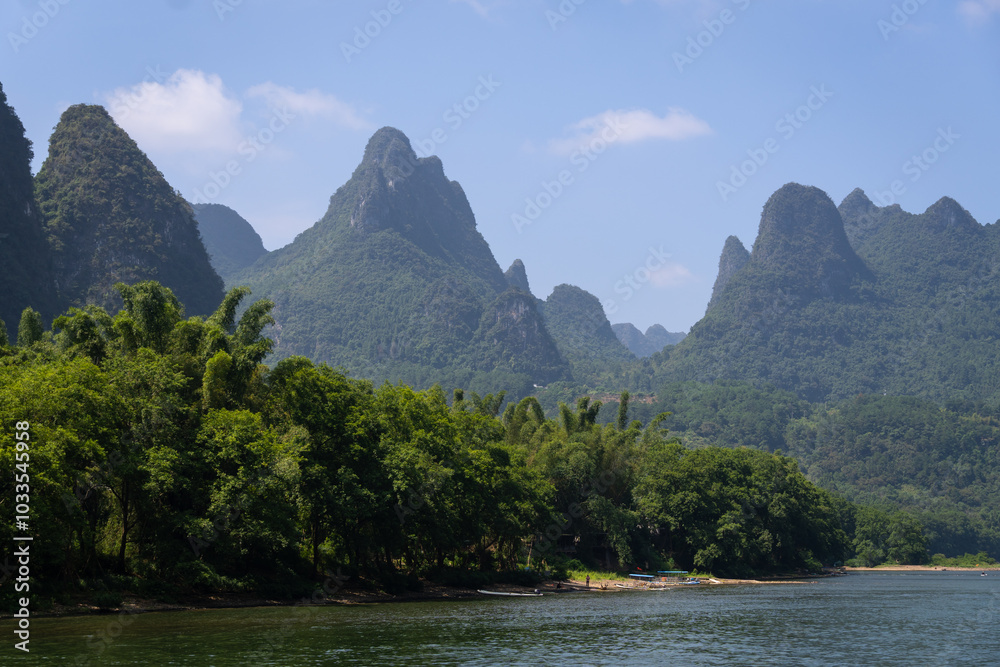 Guilin, China: Karst landscape of the Li river between Guilin and Yangshuo in southern China on a sunny day.