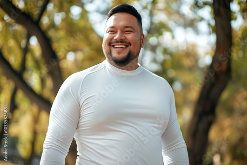 White longsleeve apparel sports smile.