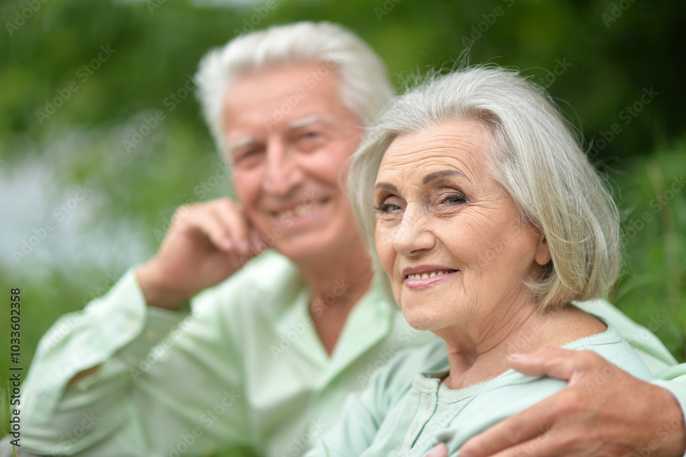 Portrait of beautiful senior couple posing in the park Portrait of beautiful senior couple posing in the park