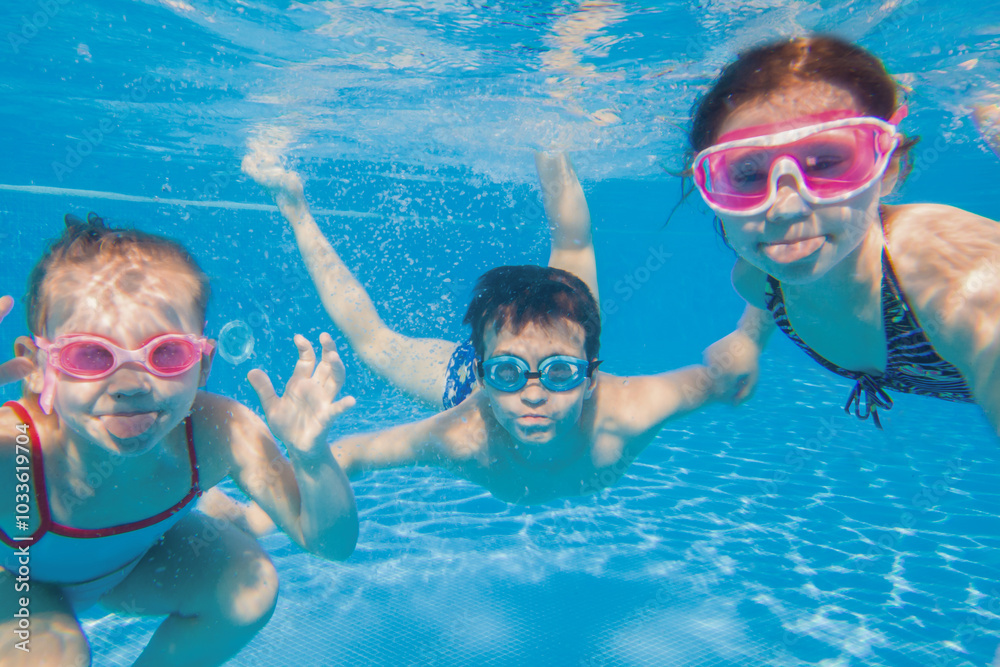 kids swiming in pool