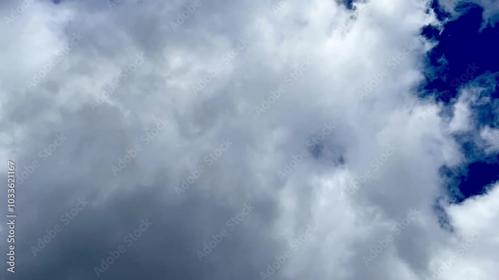 Time-Lapse of Clouds Floating Across a Blue Sky