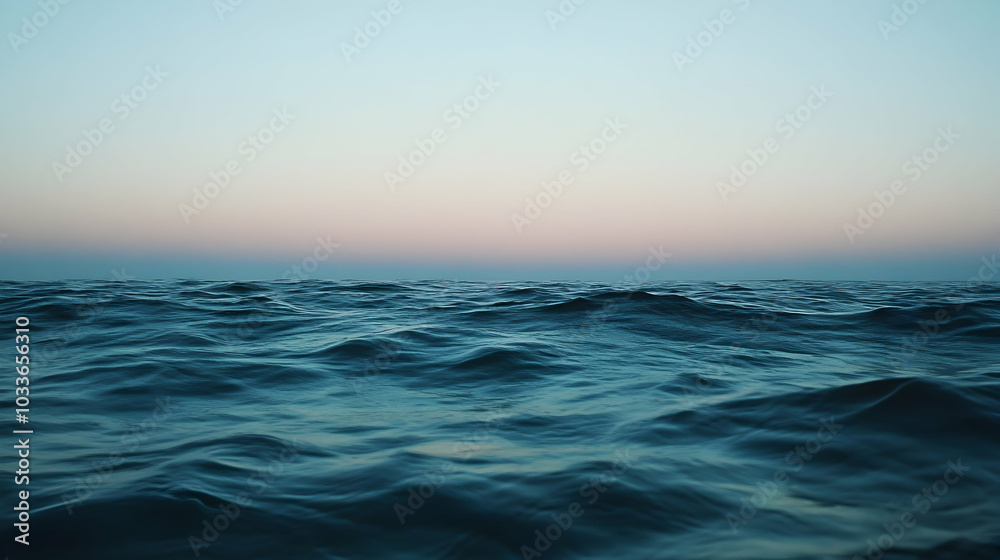 Fototapeta premium A calm ocean with small, gentle waves -