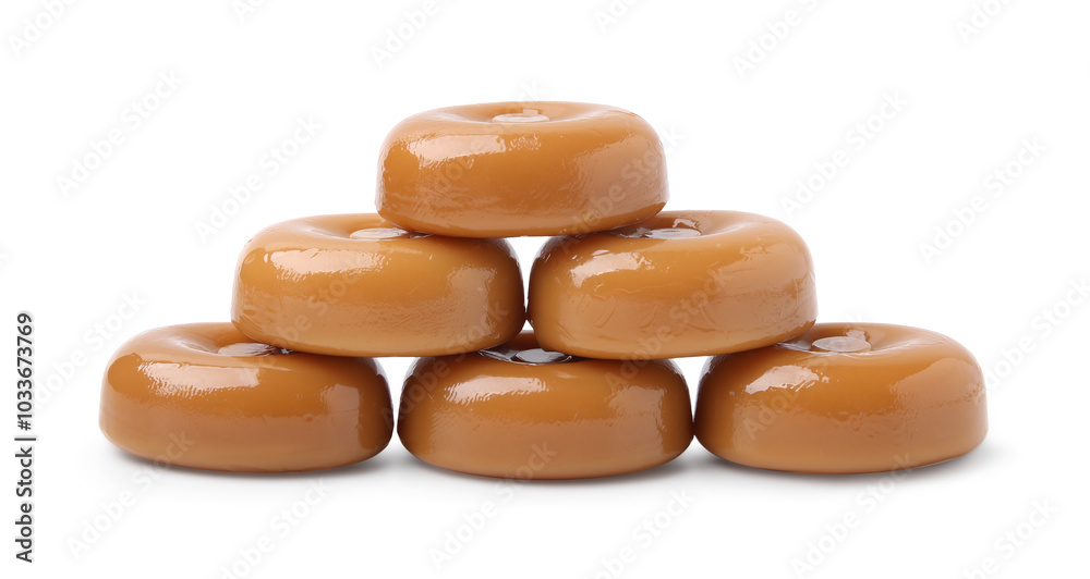 Tasty hard toffee candies isolated on white Tasty hard toffee candies isolated on white