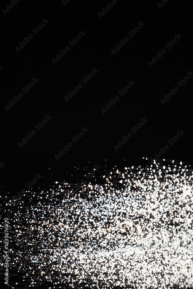 Abstract black and white background of pouring flour, space for text Abstract black and white background of pouring flour, space for text