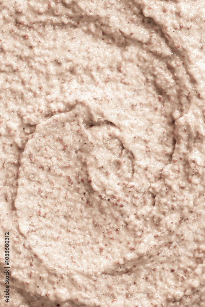 Texture of porridge close-up. Baby food, coarse porridge. Background texture of food for children. Texture of porridge close-up. Baby food, coarse porridge. Background texture of food for children.