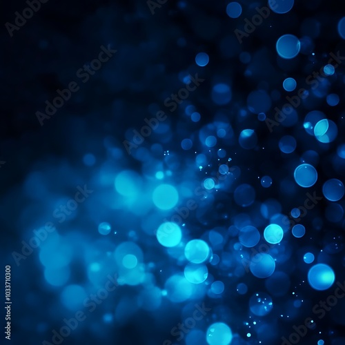 A vibrant blue bokeh background with soft, glowing circles, ideal for digital design.