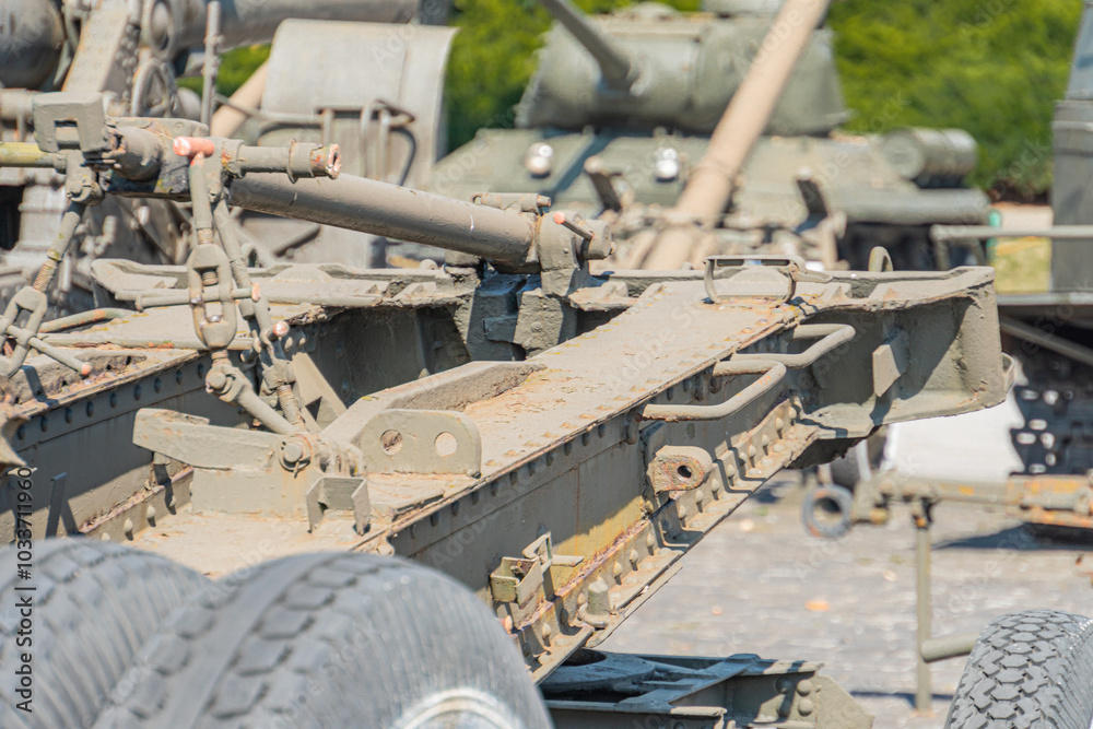 Supplies of weapons for Ukraine. Ukrainian artillery, detail of weapons Russian-Ukrainian war. Part of the weapon in close up. Military khaki coloring. Metal gun metal. New guns artillery Supplies of weapons for Ukraine. Ukrainian artillery, detail of weapons Russian-Ukrainian war. Part of the weapon in close up. Military khaki coloring. Metal gun metal. New guns artillery