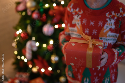 Near the gift boxes and food on Christmas Day