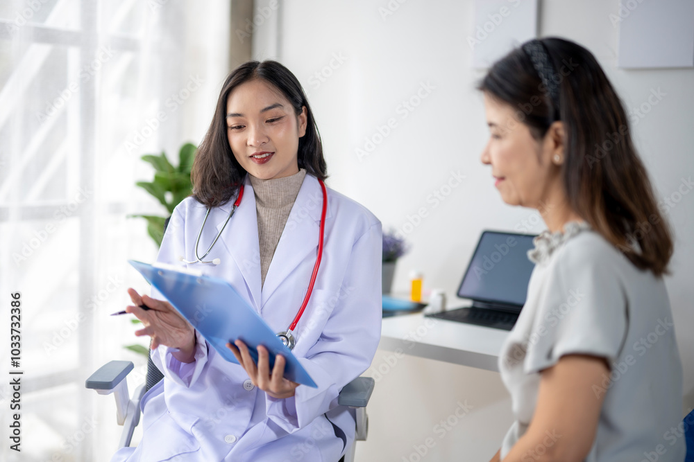Female doctor is explaining a diagnosis to her patient Female doctor is explaining a diagnosis to her patient