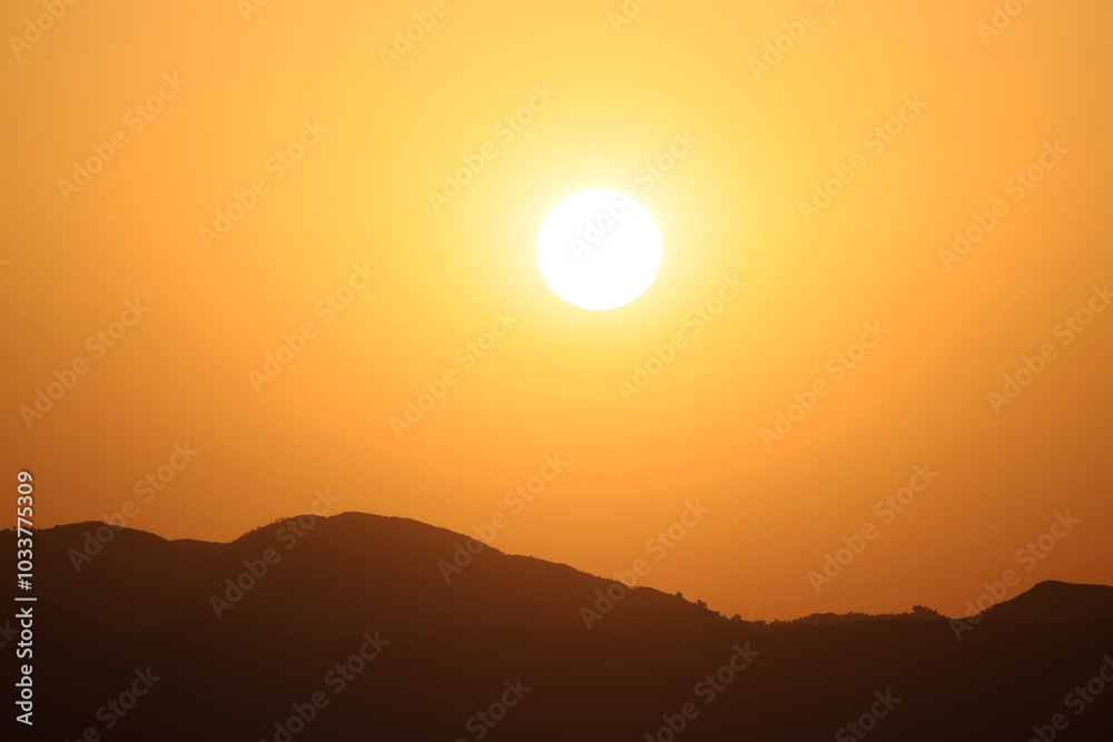 Obraz premium Breathtaking Sunset View Over the Hills