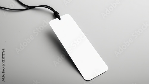 Realistic bookmark mockup featuring a simple, rectangular design. Perfect for showcasing book-related designs or promotional materials in a clean, minimal setting