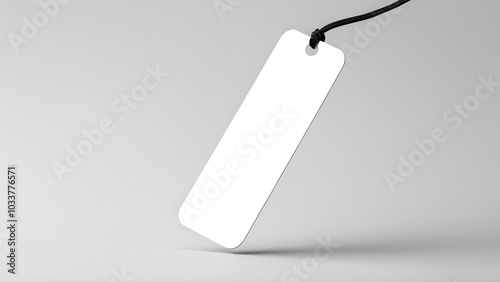 Realistic bookmark mockup featuring a simple, rectangular design. Perfect for showcasing book-related designs or promotional materials in a clean, minimal setting