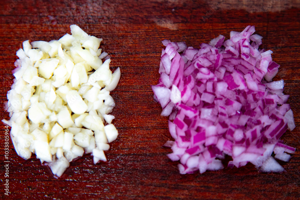 The classic dynamic duo of seasoning, chopped onion and garlic The classic dynamic duo of seasoning, chopped onion and garlic