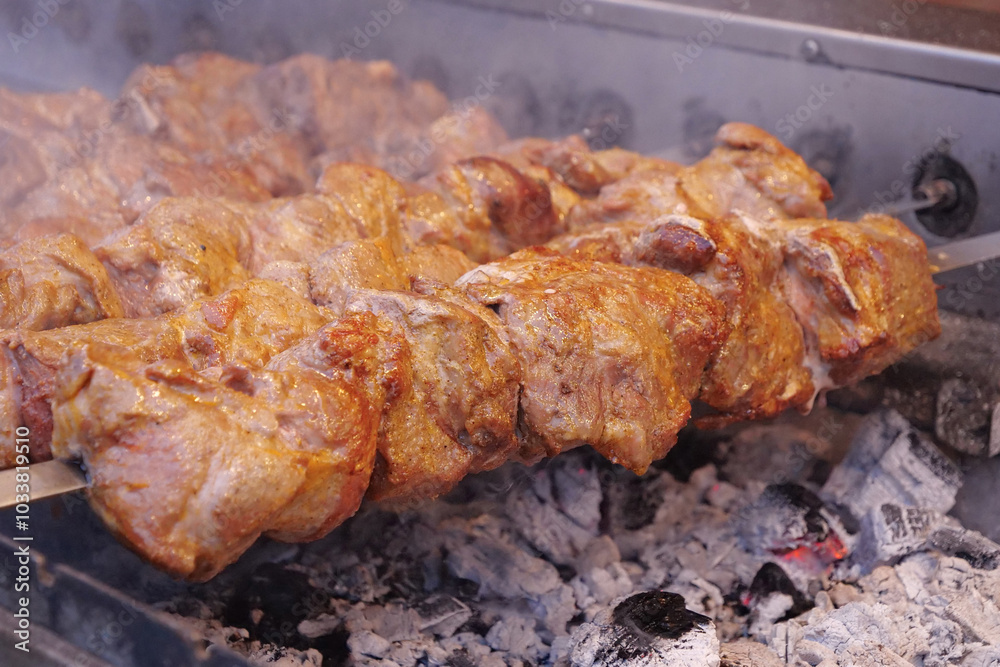 Kebabs on skewers are grilled on hot coals Kebabs on skewers are grilled on hot coals