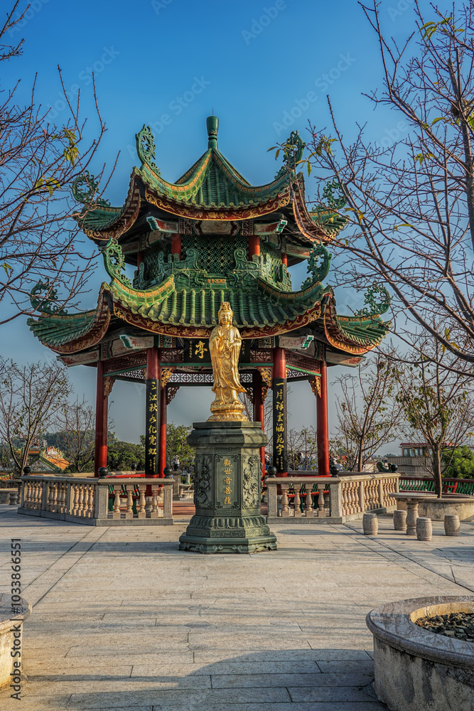 Guangzhou city, Guangdong, China. Zini Village, Shawan Town, Panyu Nanyue Garden. The garden features common elements of Chinese Lingnan garden architecture such as ponds, bridges, pavilions. Guangzhou city, Guangdong, China. Zini Village, Shawan Town, Panyu Nanyue Garden. The garden features common elements of Chinese Lingnan garden architecture such as ponds, bridges, pavilions.