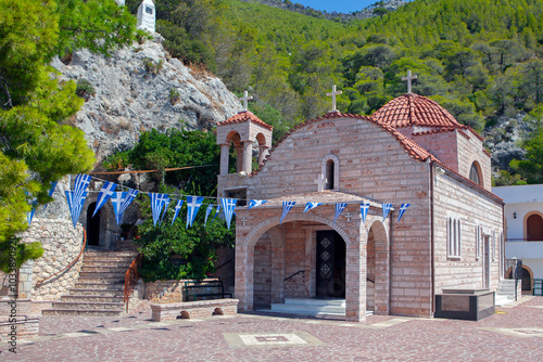 Τhe church of the Dormition of the Virgin ,in the monastery of Saint Patapios in Loutraki,Corinthia, Peloponnese, Greece. Sunny summer day with blue sky