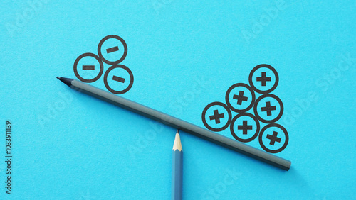 Pros and cons on scales. Costs and profits. Advantages and disadvantages. Evaluating profit and losses. Plus and minus symbols on balance on a scales photo